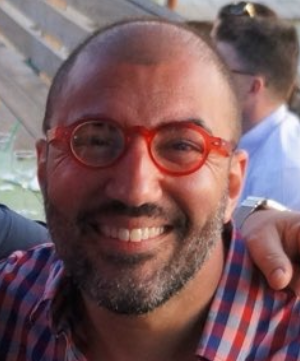 Deaf,  Italian, Male with short beard and mustache, wearing reed rimmed glasses and plaid shirt